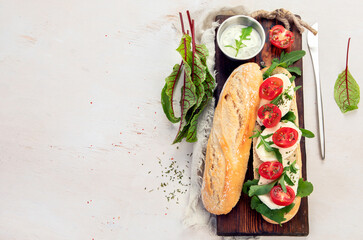 Baguette with tomato and mozzarella.