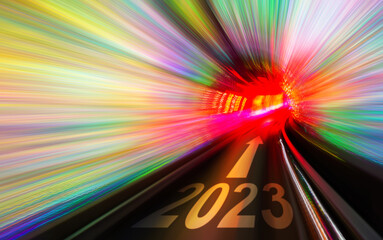 Train moving fast from new year 2023 in tunnel with arrow sign