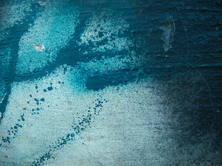 Bright streaks of paint on a abstract background. Blue and black.