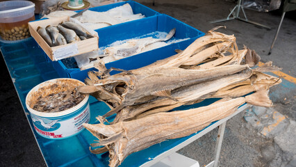 Salted fish at a farmers outdoor Italian market. 