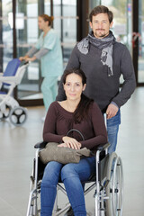 Fototapeta na wymiar female patient on wheelchair arriving at the hospital
