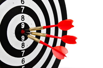 Three darts hitting on center target