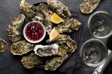 Fresh oysters with glasses of sparkling wine
