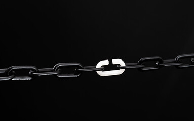 Fototapeta premium Black plastic chain one link made white