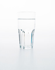 A glass of water on white background
