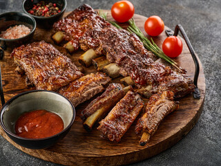 Delicious smoked pork ribs glazed in BBQ sauce.