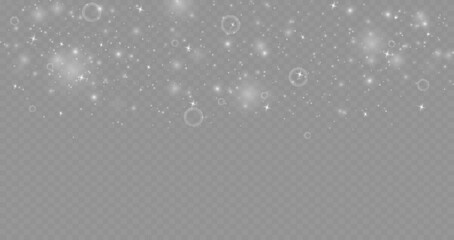 Dust sparks and stars shine with a special light. Christmas light effect. Glittering particles of magic dust.Vector sparkles on a transparent background.