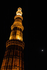 Qutub minar at night with lights