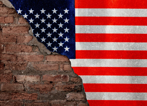 American flag on broken brick wall