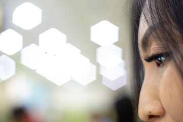 eyes of woman using smart phone