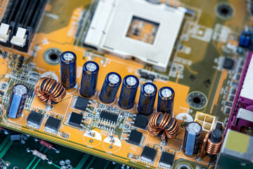 colored motherboard lies on the table completely covering it.