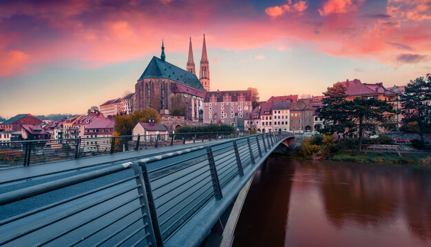 Empty walkway bridge to St Peter and Paul&rsquo;s Church. Splendid autumn cityscape of Gorlitz, eastern Germany on the Polish border, Europe. Traveling concept background.