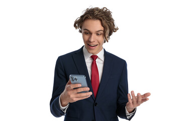 proud young businessman reading work emails and being excited