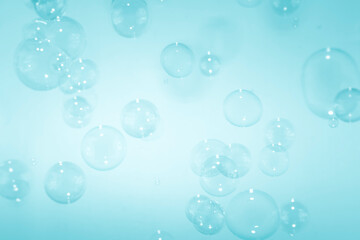 Abstract Transparent Blue Soap Bubbles Background. Freshness Soap Sud Bubbles Water.