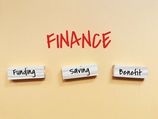 Finance flow concept. Funding, saving and benefit written on wooden blocks.