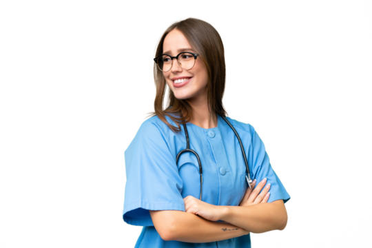 Young nurse caucasian woman over isolated background with arms crossed and happy