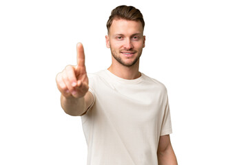 Young blonde caucasian man over isolated background showing and lifting a finger