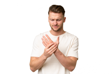 Young blonde caucasian man over isolated background suffering from pain in hands