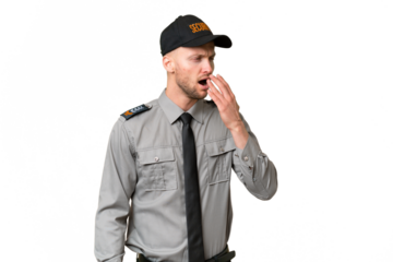 Young security caucasian man over isolated background yawning and covering wide open mouth with hand
