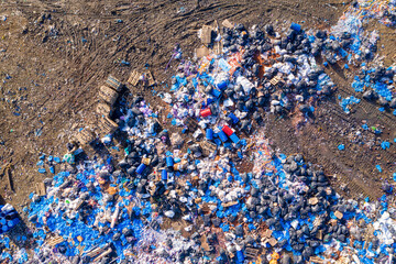 Top view of a huge dump of toxic and household waste. The problem of environmental pollution