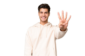 Young caucasian handsome man over isolated background happy and counting four with fingers