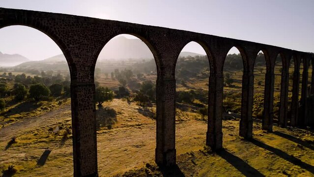 Cinematic aerial drone shot of UNESCO world heritage site Aqueduct of Padre Tembleque in Mexico captured at the time of sunset