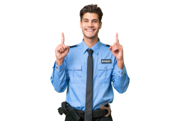 Young police man over isolated background pointing up a great idea
