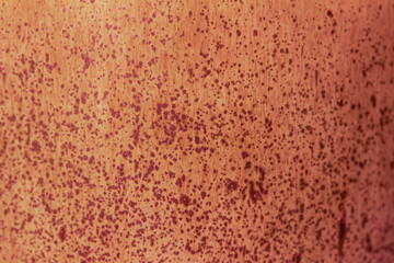 Abstract texture background of a macro photographed glazed ceramic stoneware surface in the color...