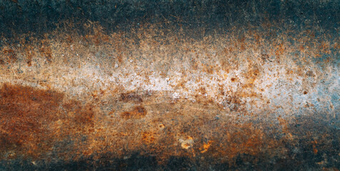 Naklejka premium Rusty surface. Metal tube. Corrosion texture. Grunge old metallic pipe with orange damage spots copy space for text logo.
