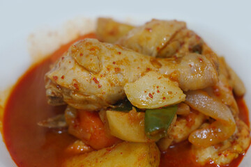 Spicy Braised Chicken is a Korean stew seasoned with chicken, potatoes and onions.