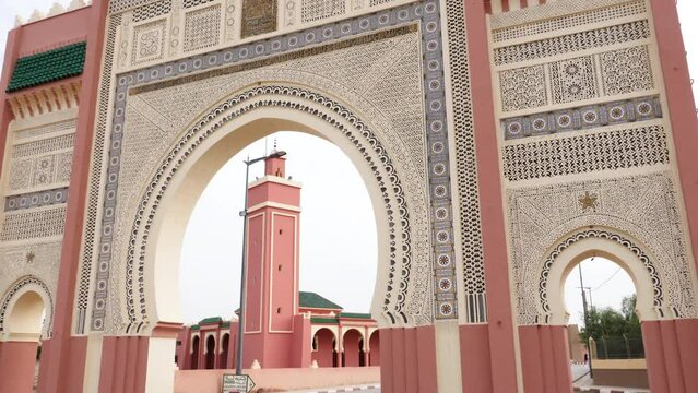 The entrance, city gate, bab, gate, door, leading into Rissani, South Morocco. Landmark and iconic touristic site of Rissani. 4k footage.