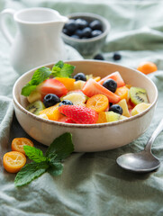 Healthy fresh fruit salad in a bowl