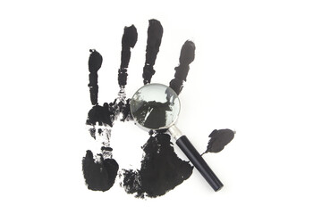Magnifying glass and handprint on white background. 