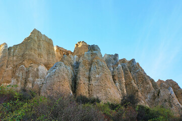 The dramatic rock formations of the Clay Cliffs at dusk, near Omarama, Waitaki, New Zealand
