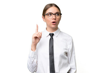 Young business caucasian woman over isolated background thinking an idea pointing the finger up