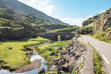 Wishing Bridge in green valley, Gap of Dunloe in Black Valley, Ring of Kerry, County Kerry, Ireland
