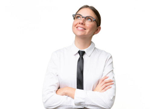 Young business caucasian woman over isolated background looking up while smiling