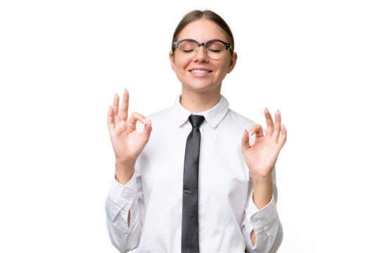 Young business caucasian woman over isolated background in zen pose