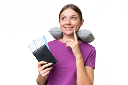 Young beautiful blonde woman with Inflatable travel Pillow over isolated background thinking an idea while looking up