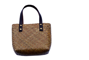 Handmade woven bag, isolated on white background. Concept : Eco friendly and reusable bag. Made from natural material. Zero waste. Plastic free. Fashionable handbag in Thailand.