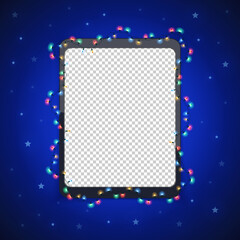 Naklejka premium Christmas Tablet with Glowing Lights on Blue
