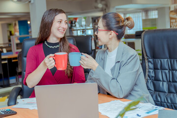 Finance,accounting,Businesswomen analyzing investment charts with calculator laptop calculate technology in office, marketing business analysis data concept