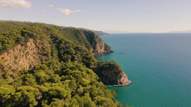 Dense Forest And Rocky Cliffs In The Seacoast Of Greece In The Preveza Region. Aerial Drone Shot