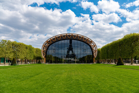 Paris, France - May 03 2021: Reflection of the Eiffel tower in the Ephemeral Grand Palais on the Champs de Mars. This temporary replica of the Grand Palais is a GL events construction.
