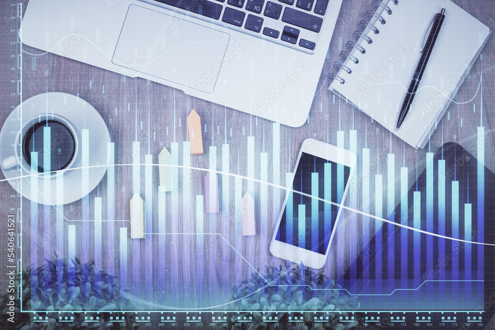 Poster double exposure of financial chart hologram over desktop with phone. top view. mobile trade platform