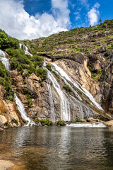 Ezaro waterfall, Galicia, Northern Spain in Spring. It empties into the Atlantic ocean in a waterfall