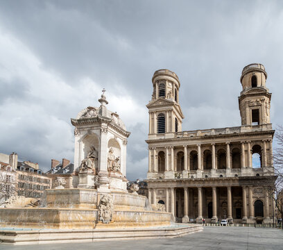 Church and fountain of Saint Sulpice in winter