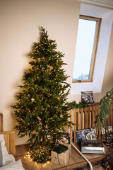 Decorated Christmas Tree With Gift Boxes in the bedroom in the reflection of the mirror In The Bright Interior Of The House
