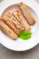 tuna slice seafood fish canned in oil meal food snack on the table copy space food background 