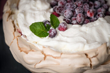 Detail of Christmas cake Pavlova with cranberries